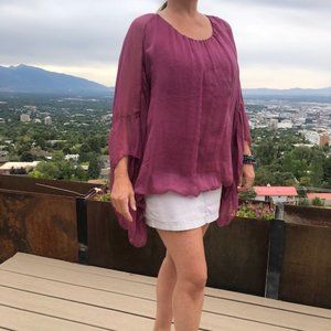 Rose silk top, lined. Never worn bought in Europe!